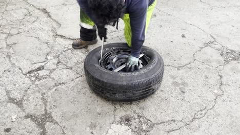 hispanic man working as a roadside assistance