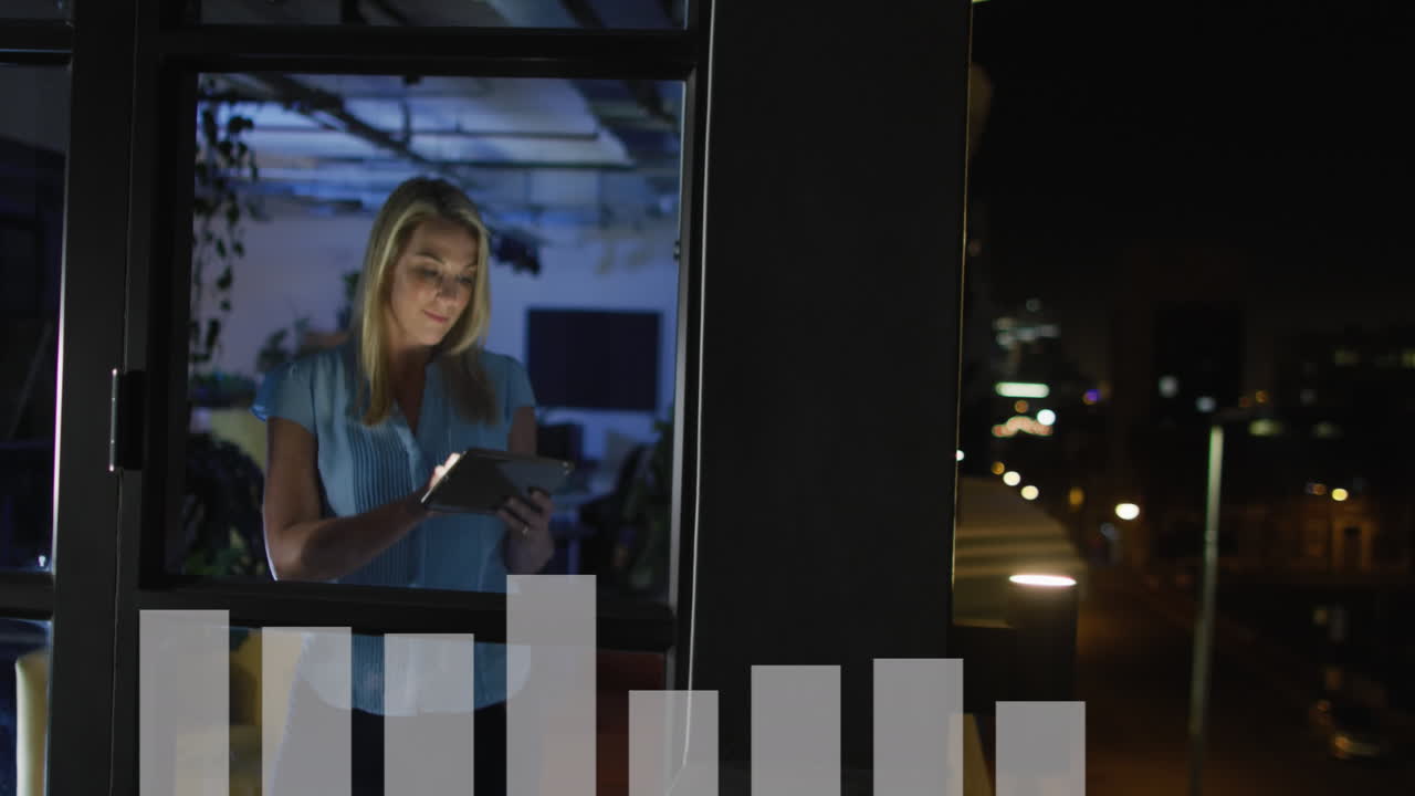 Animation of financial data processing over caucasian businesswoman working in office