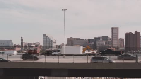 Street-level-view-of-cars-on-a-freeway