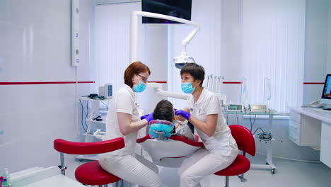 young boy visiting dentist. little boy sitting in the dentists office