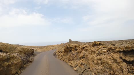 desert highway, laba volcanoes, timanfaya natural park in lanzarote, spain, canary islands