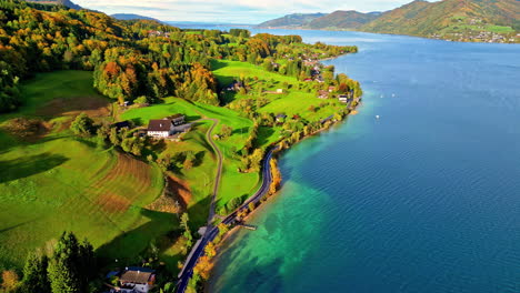 lake attersee in austrian alps, shoreline view from drone