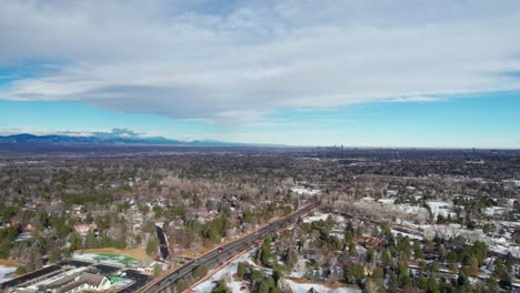 drone aerial view of denver, colorado suburb, greenwood village with skyline