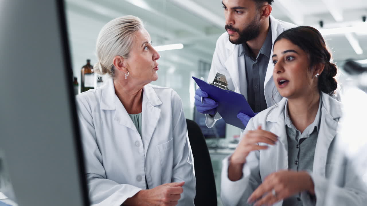 Scientists Collaborating in a Lab