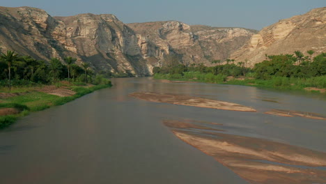 Flight-over-the-Catumbela-River,-Benguela,-Angola-Footage-with-Drone,-120-fps