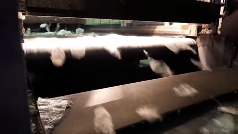 conveyor with plastics and pet bottles. industrial, equipment, production, and manufacturing concept.