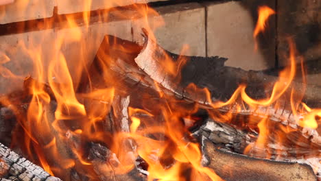 Natural-wood-charcoal-grill-in-slow-motion