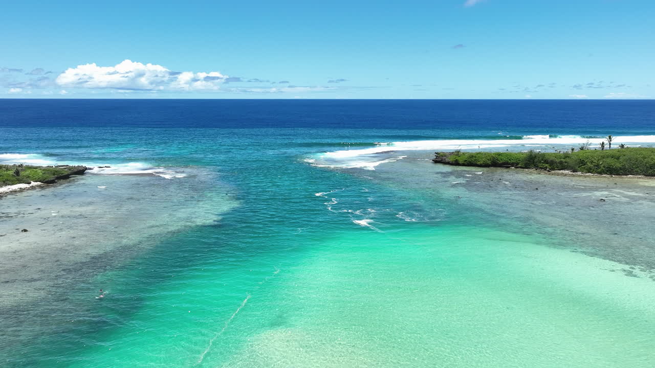 Entrance of Avana Passage harbor in Rarotonga Cook Islands with sand bar