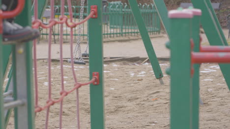 Swinging-swing-in-the-playground.-Empty-play-area