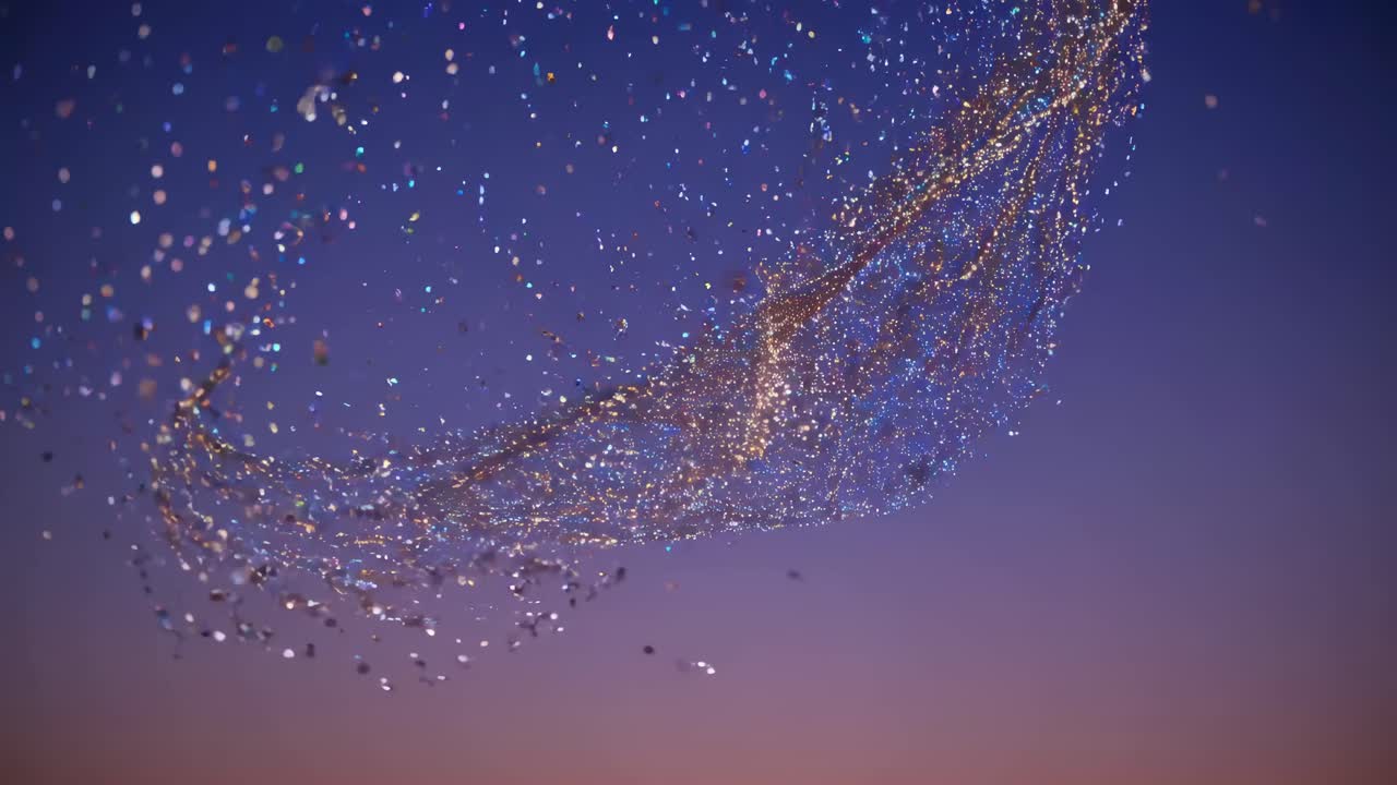 A mesmerizing swirl of sparkling particles against a twilight sky, captured from a low-angle