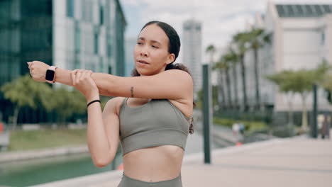 woman stretching in urban setting