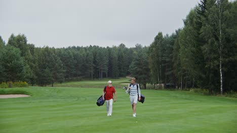 two men playing golf