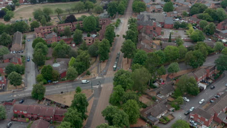 Overhead-following-drone-shot-of-Nottingham-tram