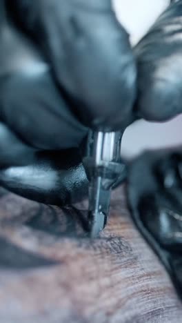 tattoo artist at work