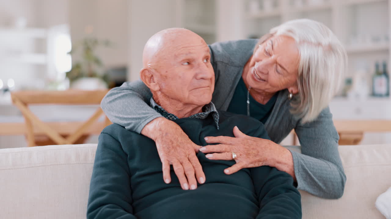 Face, hug and home with old couple