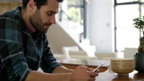 Man-using-his-phone-