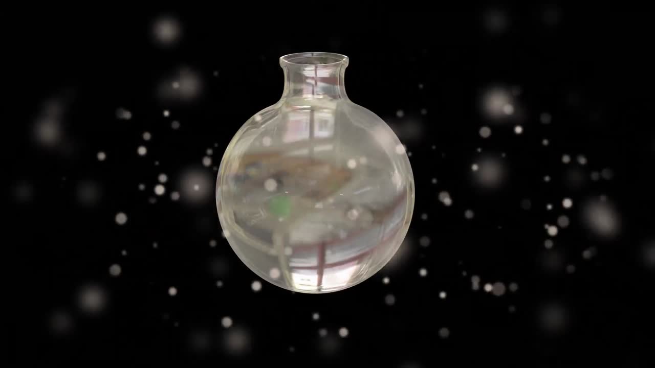 animación de una botella de vidrio de laboratorio que gira sobre luces puntuales sobre un fondo negro