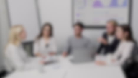 Blurry-background-of-a-startup-meeting,-entrepreneurs-meeting-to-innovate-their-business-at-an-office