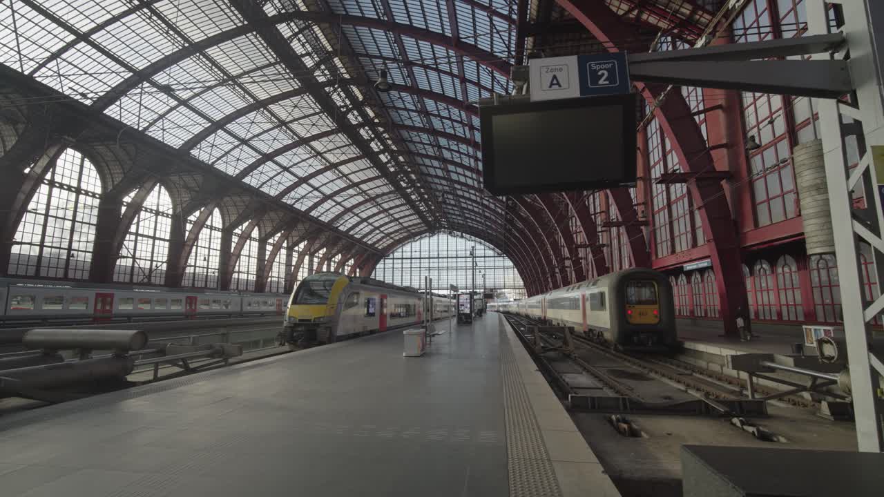 Train station interior with trains