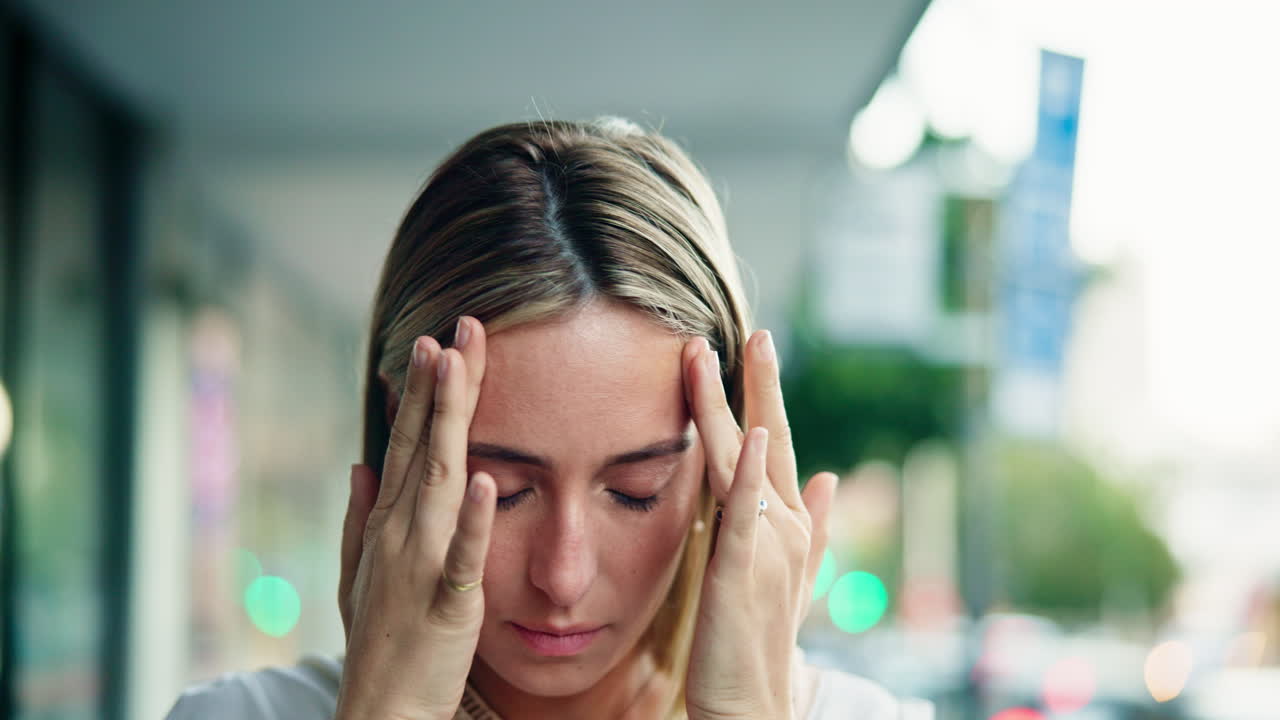 Frustrated, headache and business woman