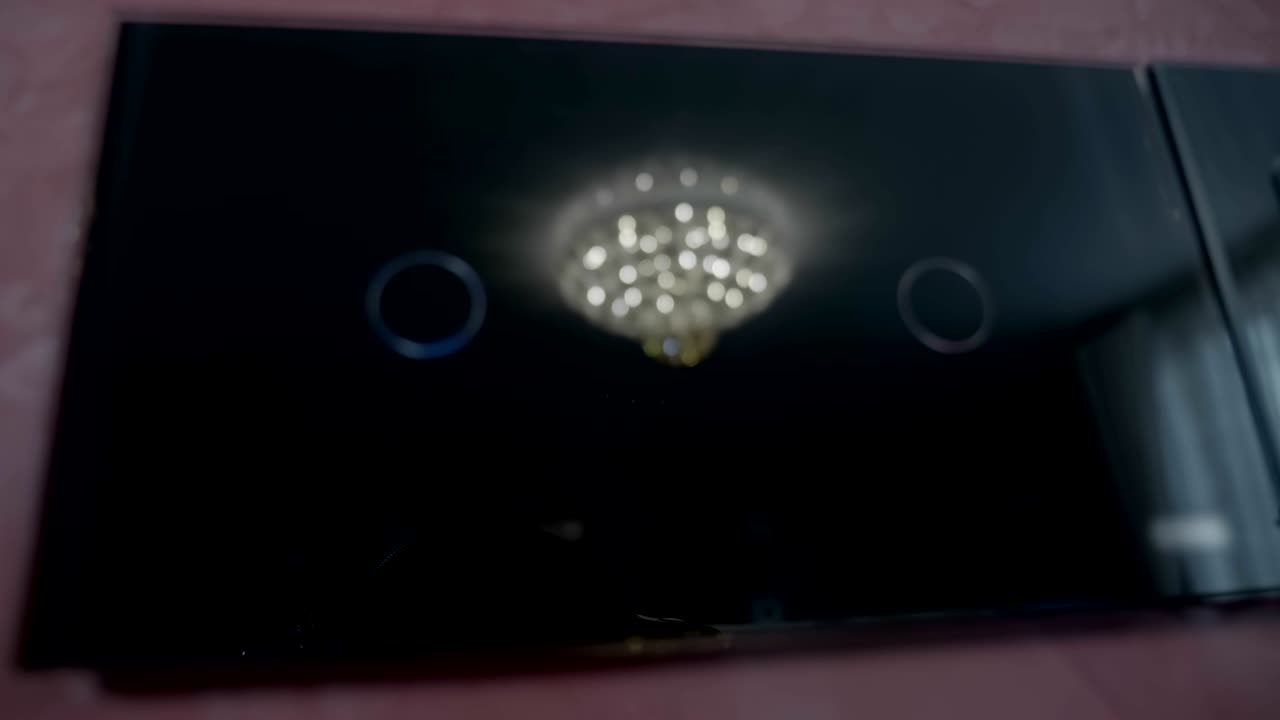 Modern high-tech touch switch of black glass on 2 lines