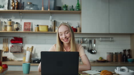 Girl-talking-video-call-with-boyfriend-send-air-kiss-to-web-camera-close-up.