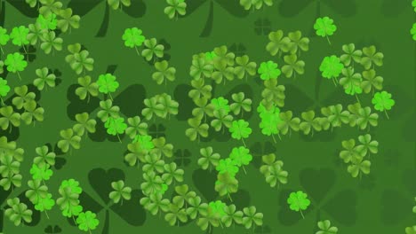 animation of green clovers in background for st. patricks day