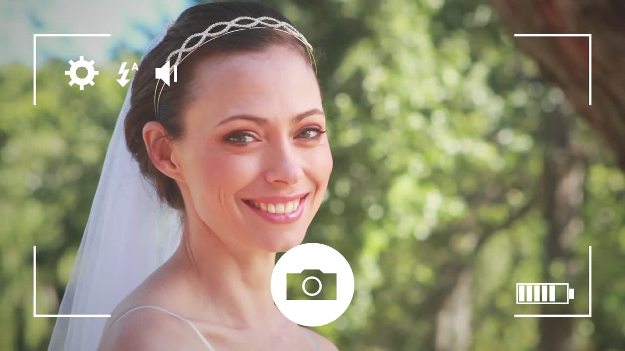 tomando fotos de una novia con una cámara digital