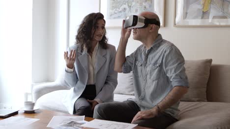 excited man looking at interior design via vr technology