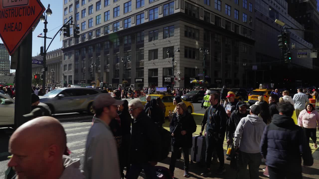 In the warm daylight, a sea of people fills the streets near Madison Square Garden, united in their support for Trump