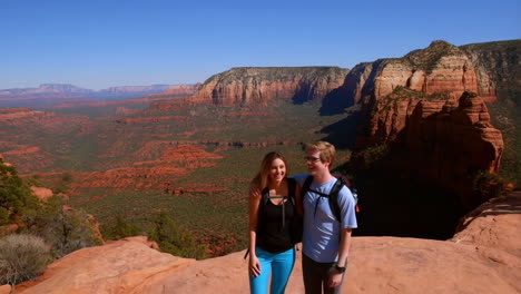 couple enjoying scenic red rock landscape in arizona