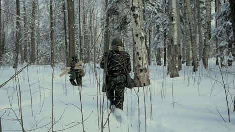 soldiers in a snowy forest