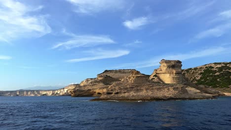 Corsica-island-coastline-and-cliffs-at-Capo-Pertusato-lighthouse-in-France,-slow-motion