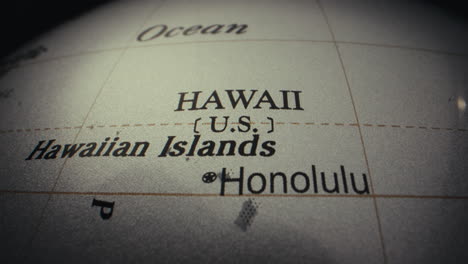 close-up of a world globe showing hawaii