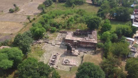 aerial drone shot of ancient hindu shiv temples and terai monastery with stepwell in shivpuri of madhya pradesh india