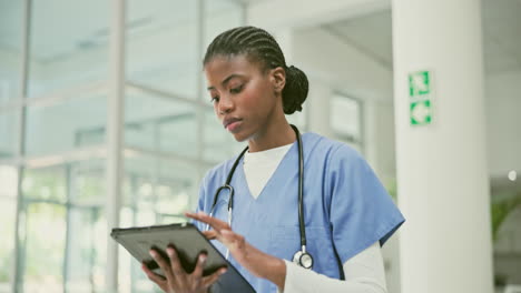 nurse using tablet in hospital