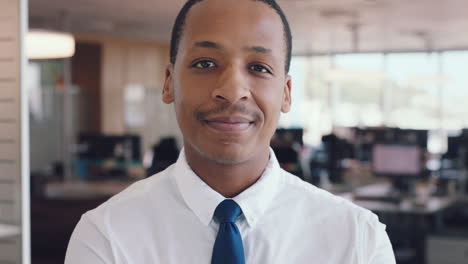 young african businessman, office portrait