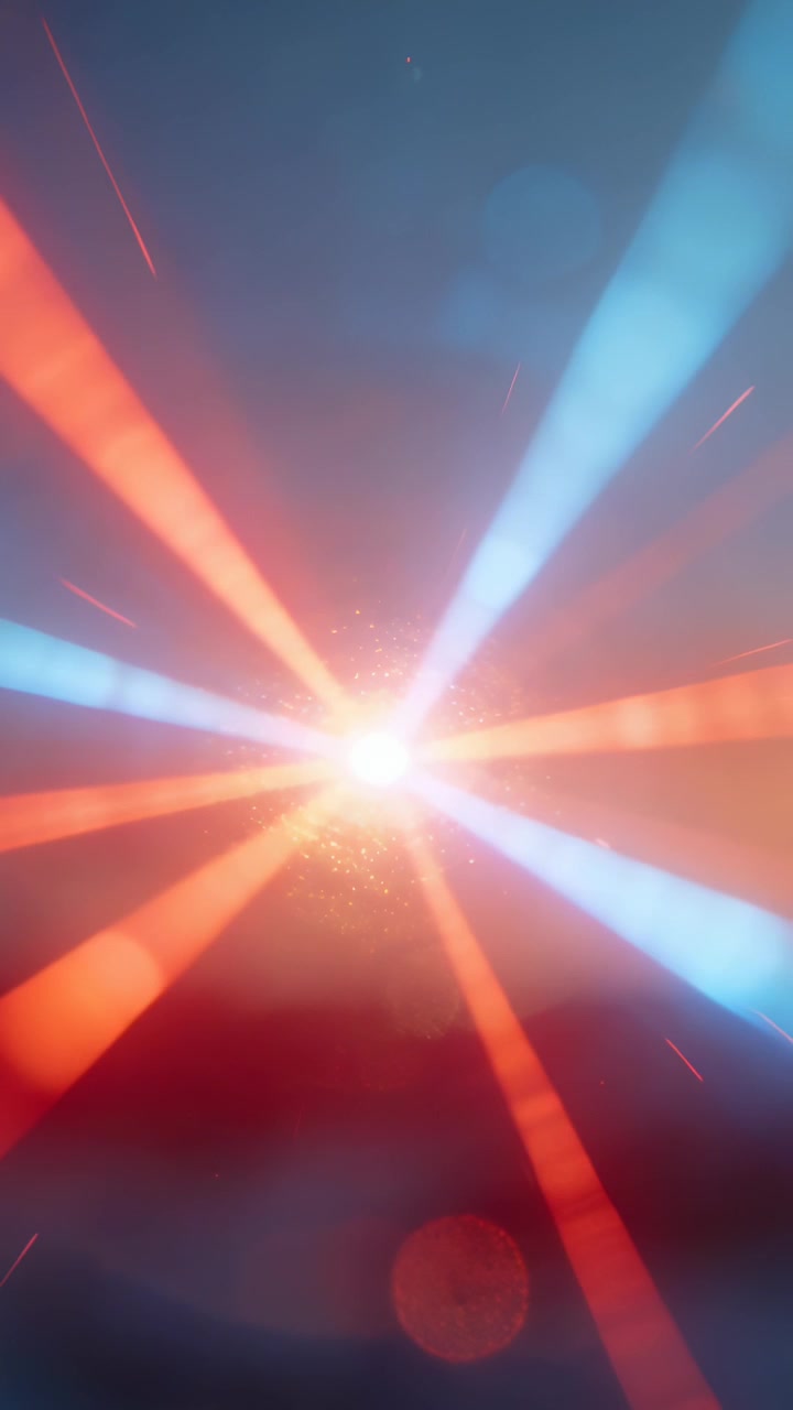 Vertical video: Blooming starburst after flash, sending red and blue beams and flare for stage