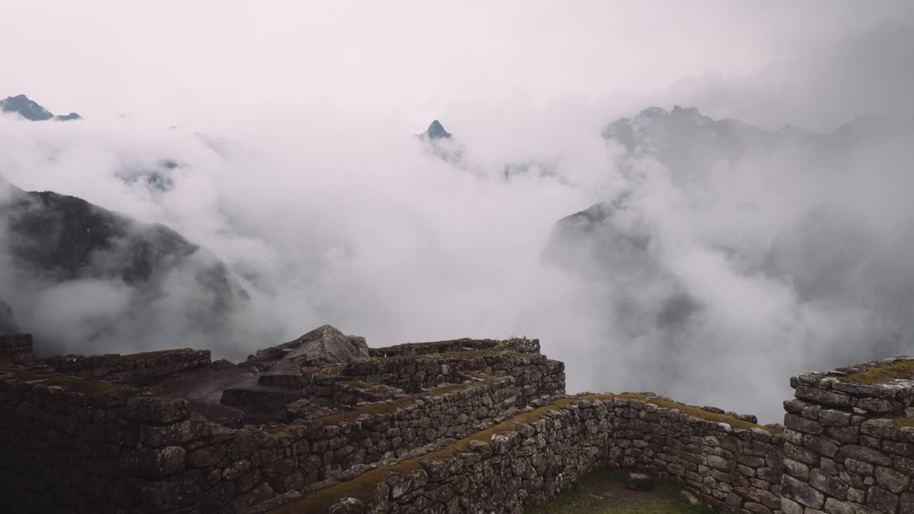 Historical Ruins Of Machu Picchu With The Misty Mountain Background In Cusco, Peru. Aerial Shot