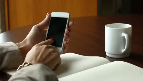 businesswoman using smartphone