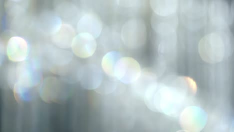 abstract bokeh lights with soft light background, bokeh blurred of chrystal chandelier.