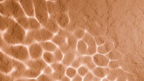 abstract water reflection on orange textured surface. sunlight ripple pattern with aquatic effect. summer and vacation concept. design for wallpaper, poster, banner, header, card. flat lay copy space