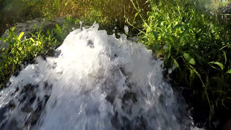 action camera view of water stream flow direct to camera