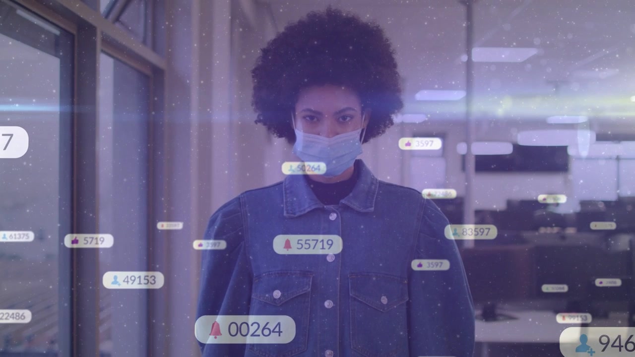 Woman standing in office corridor, badges appearing and drifting over subject, smiling at badges