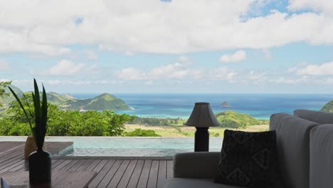 luxury mountain side villa in the south of lombok with ocean views across the infinity pool from the lounge room