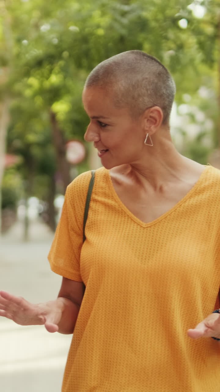Mother and Daughter Share a Laugh Over Phone Photos