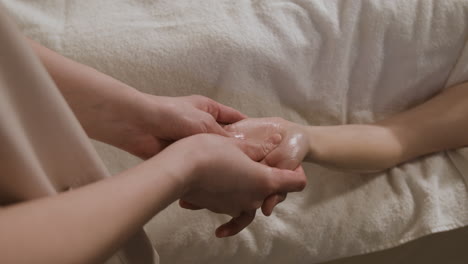 professional hand massage for relaxation and wellness