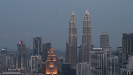 kuala lumpur city skyline at dusk