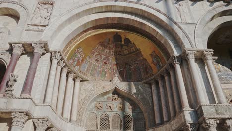 mosaic of st marks cathedral in arch of the historic cathedral in venice italy