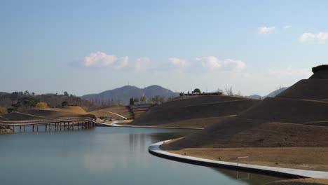 the magnificent lake garden in suncheon bay national park with bridge of dreams - static landscape on autumn day